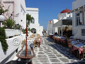 Mykanos side street with cafe